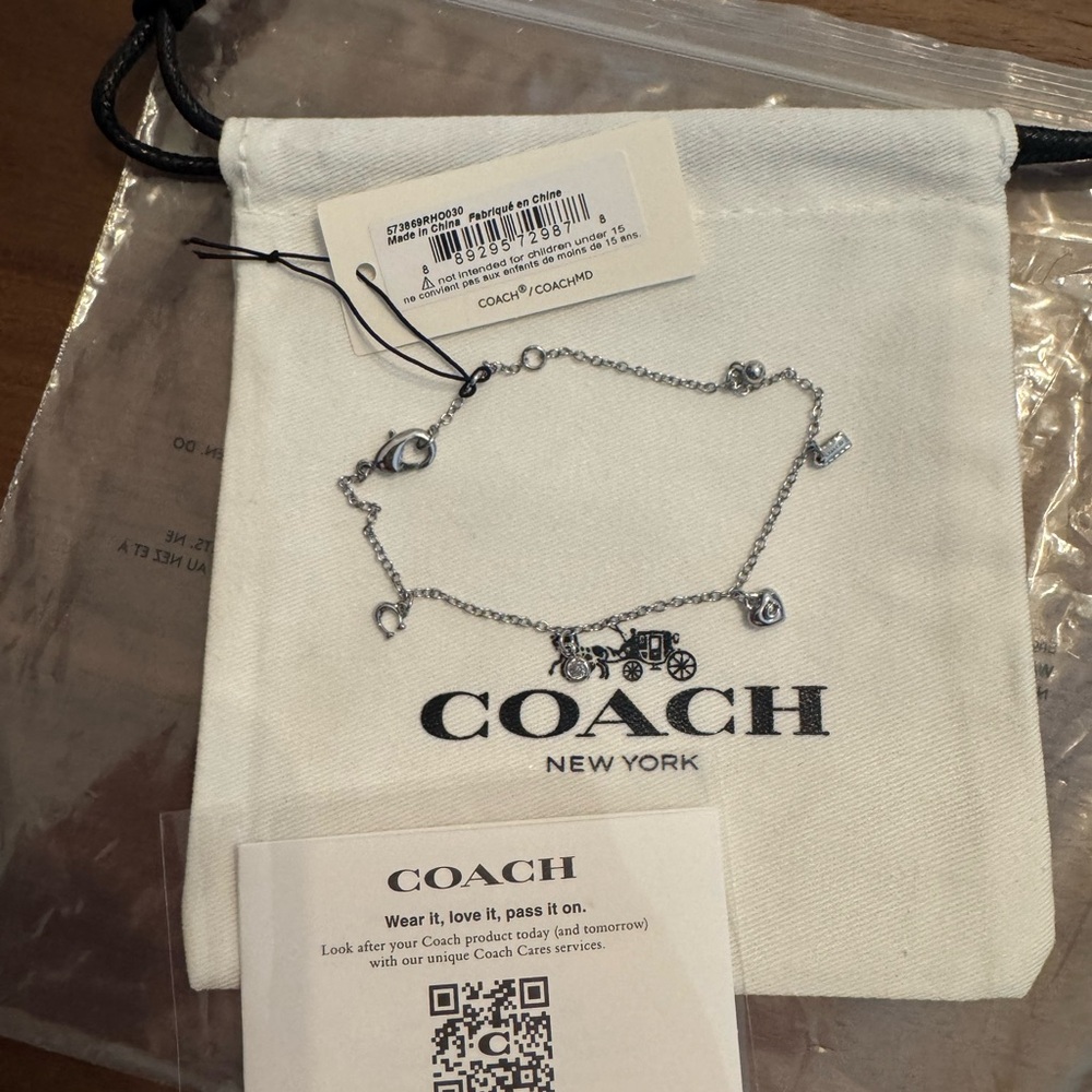 Coach Silver Charm Bracelet with Heart and Lock Charms